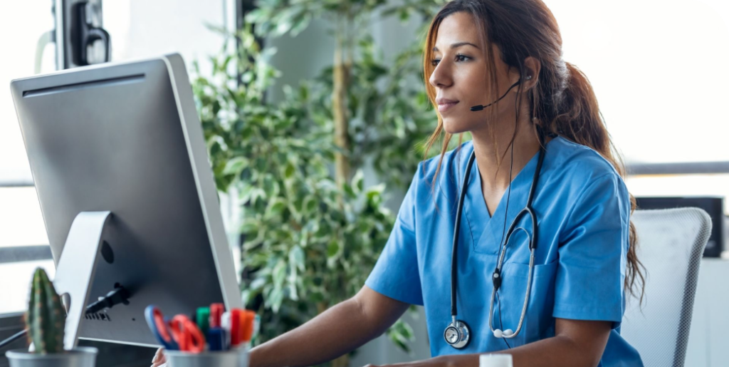 triage nurse at computer