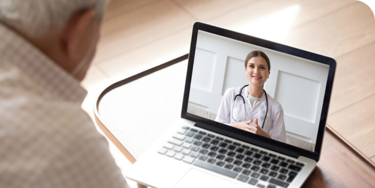 senior citizen visiting telehealth doctor on computer