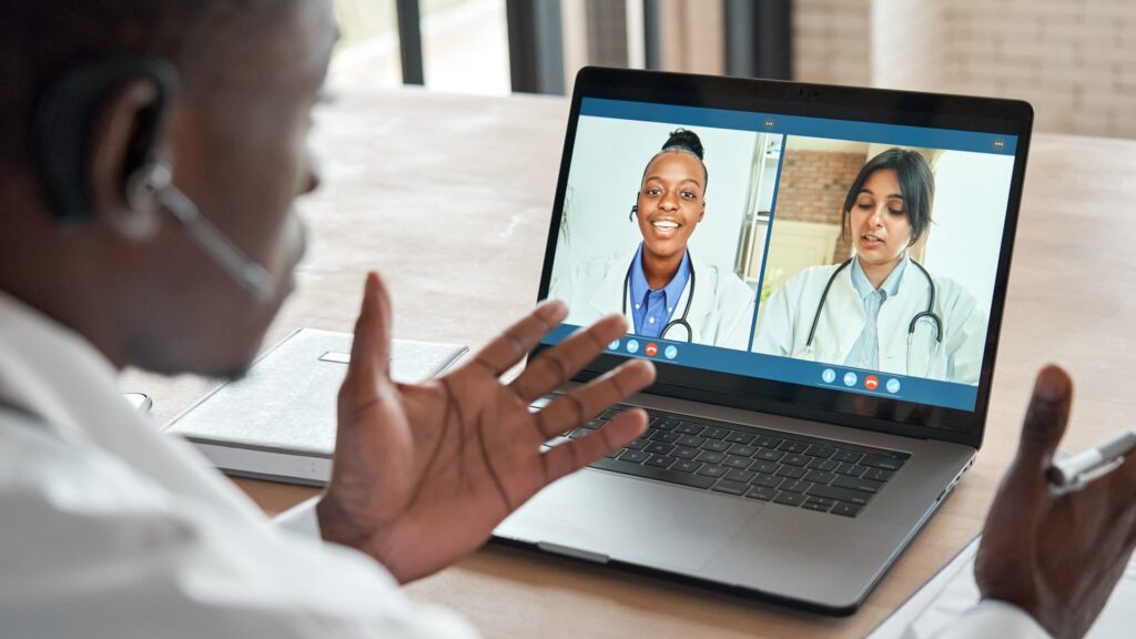 doctor on remote call with nurses