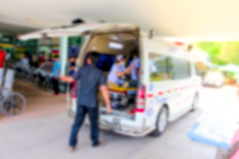 blurred photo of patient in ambulance