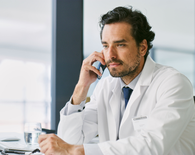 doctor on phone with healthcare solution