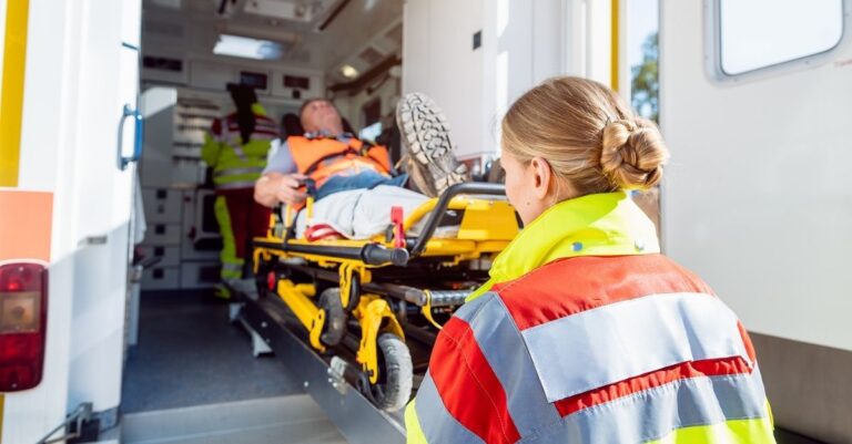 patient being transferred in ambulance