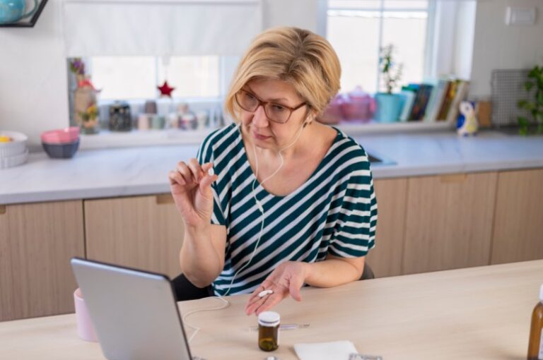 Senior patient on laptop