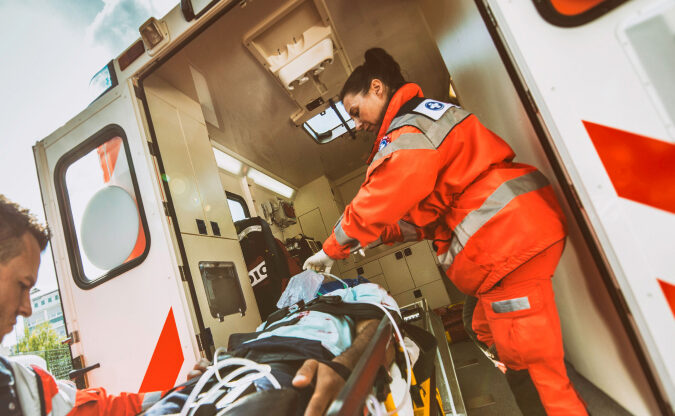patient receiving care in ambulance