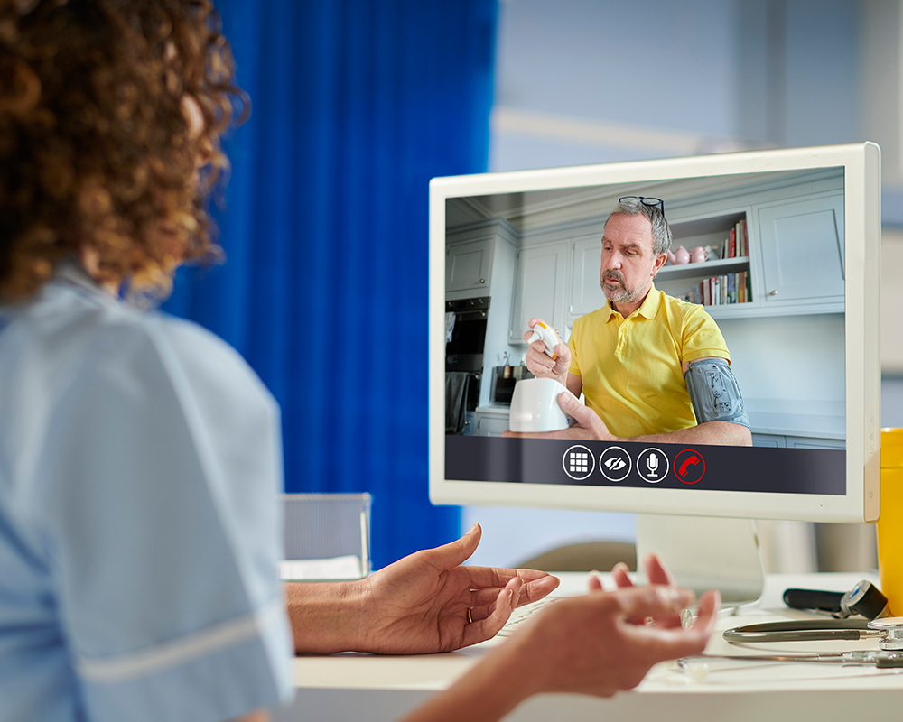 doctor remotely monitoring patient