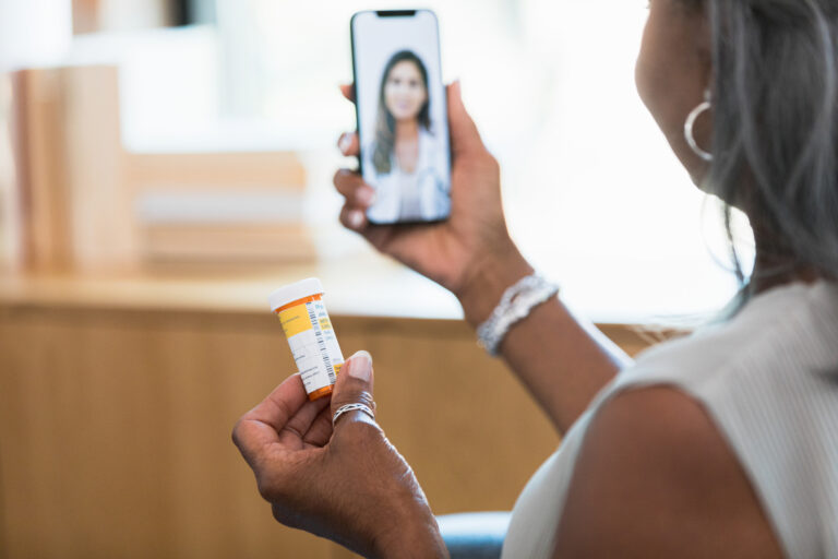 Patient discussing medication with doctor on facetime