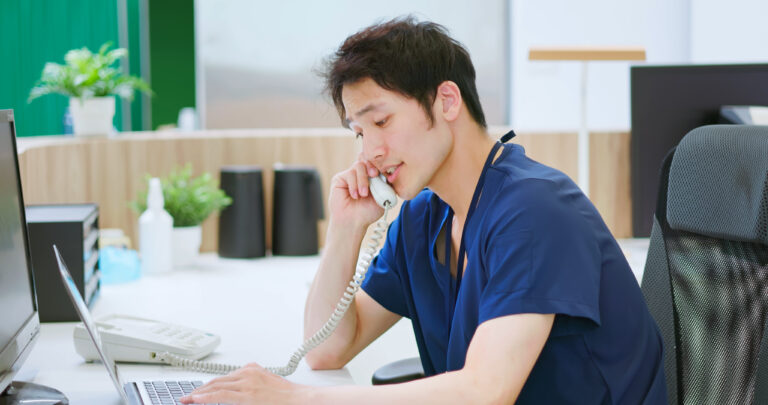 male nurses speak on phone