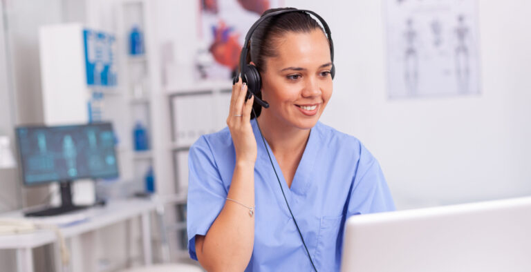 Medical staff talking with patient