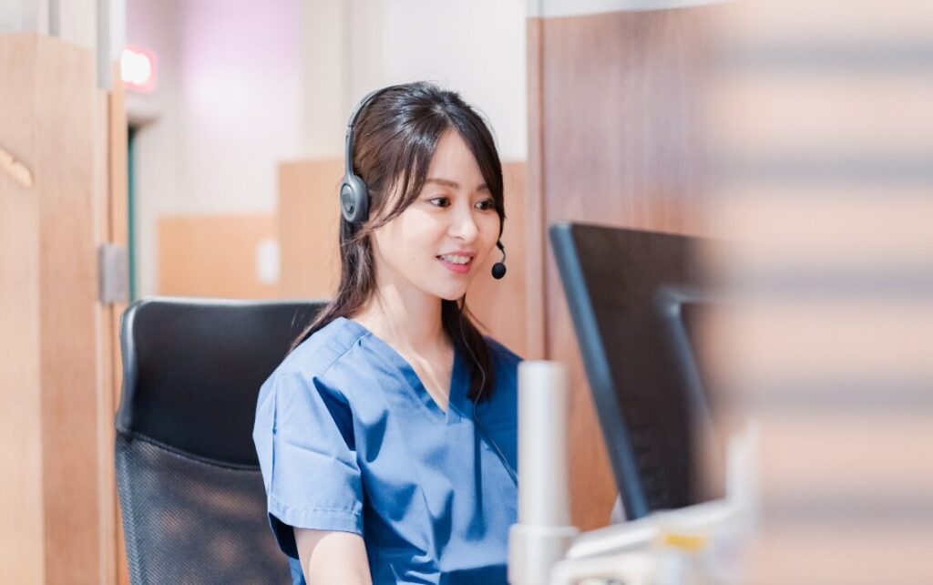 A female nurse performing a remote examination at a clinic